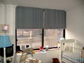 Flat roman shades for babys room windows in Midtown, Manhattan