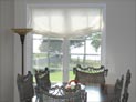 Relaxed roman shade for dining room window in Hampton, NY