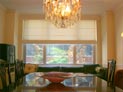 Flat roman solar shade with ribs for large window in Long Island, NY