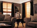 Flat solar roman shades with ribs along with side panels