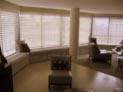 Wood blinds installed in large windows in Upper East Side apartment in Manhattan, NY