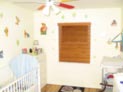 Wood blinds for babys room window in Brooklyn, NY